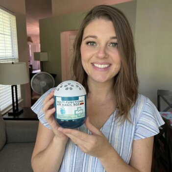 Christine holding PuriCell